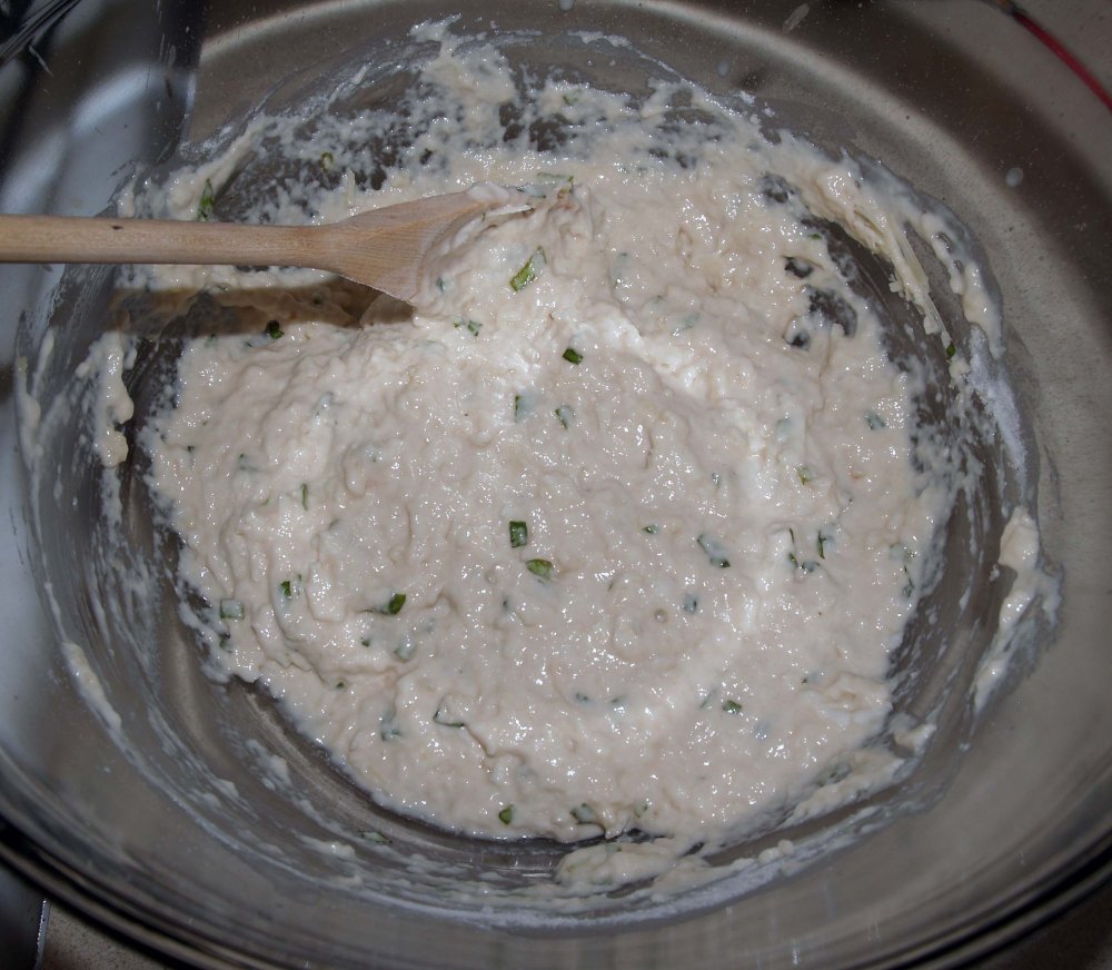 dough with cheeses and basil