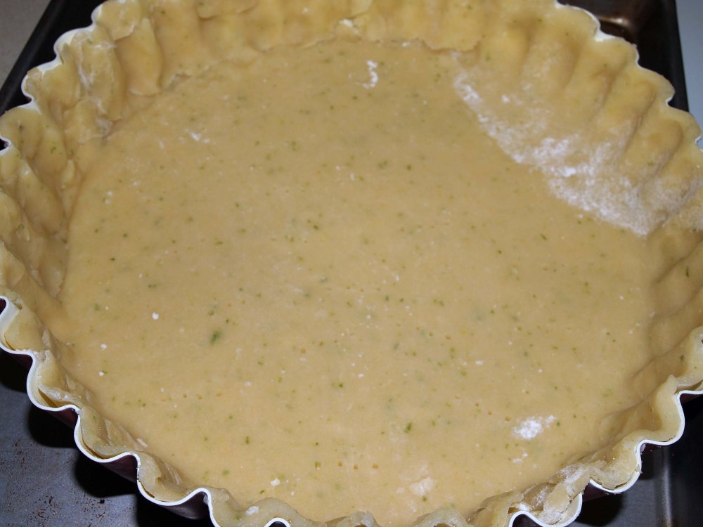 crust in tart pan ready to bake