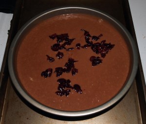 cherries sprinkled in cake batter