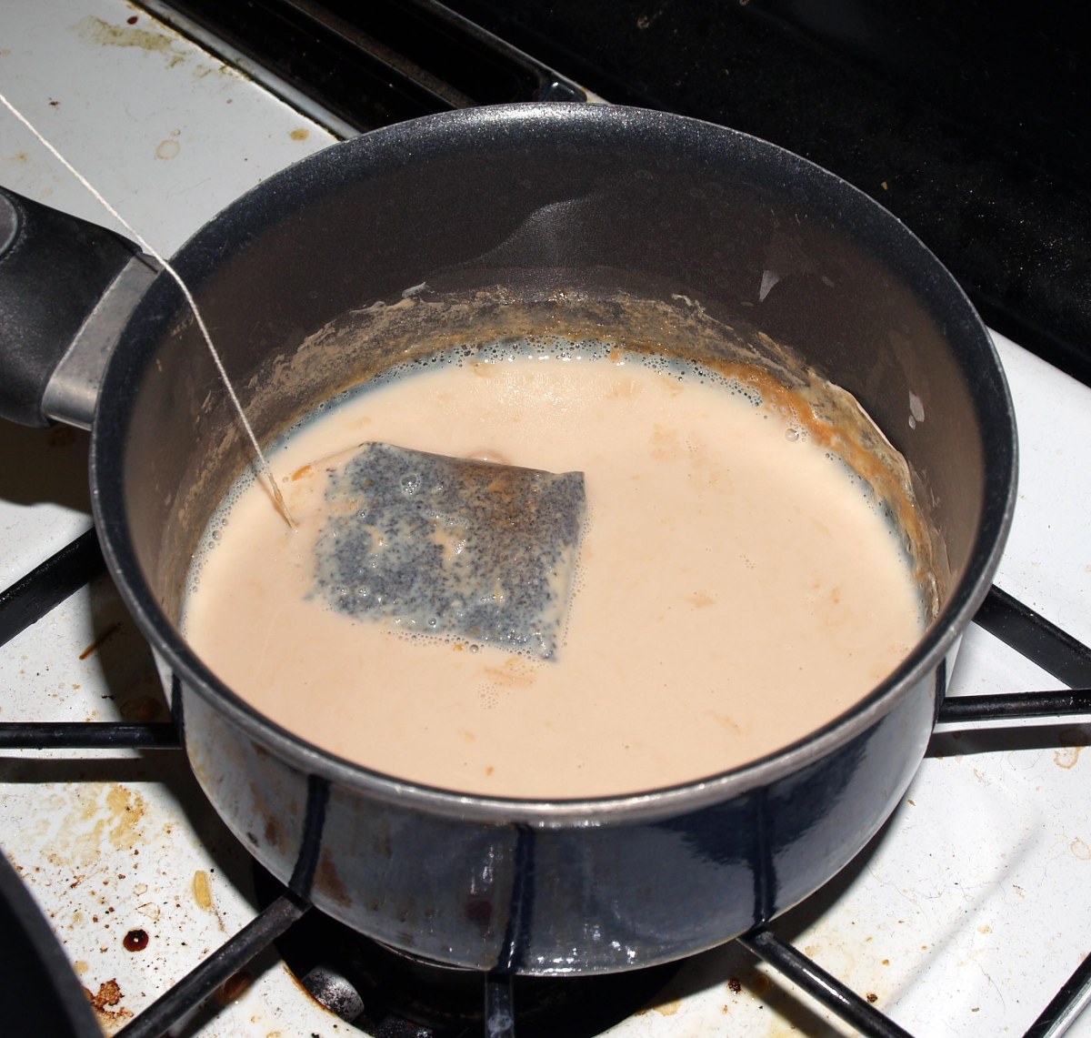 Tea Bag Steeping in Milk
