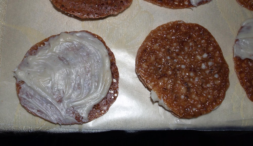 cookies with ganache spread on