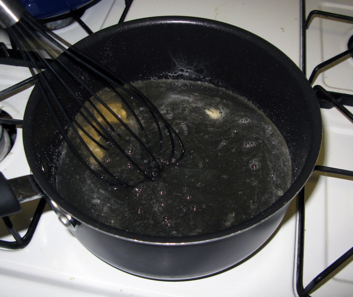 Whisking Gelatin into Mirror Glaze Base 1